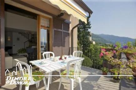 Appartamento con terrazza in vista lago