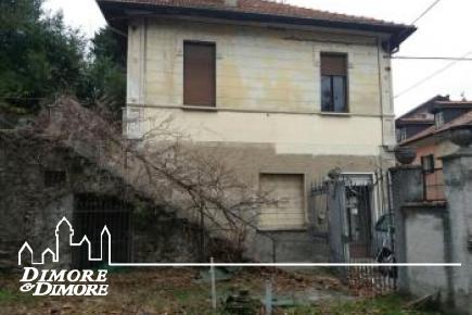 Casa  a Meina con appartamento e negozi 